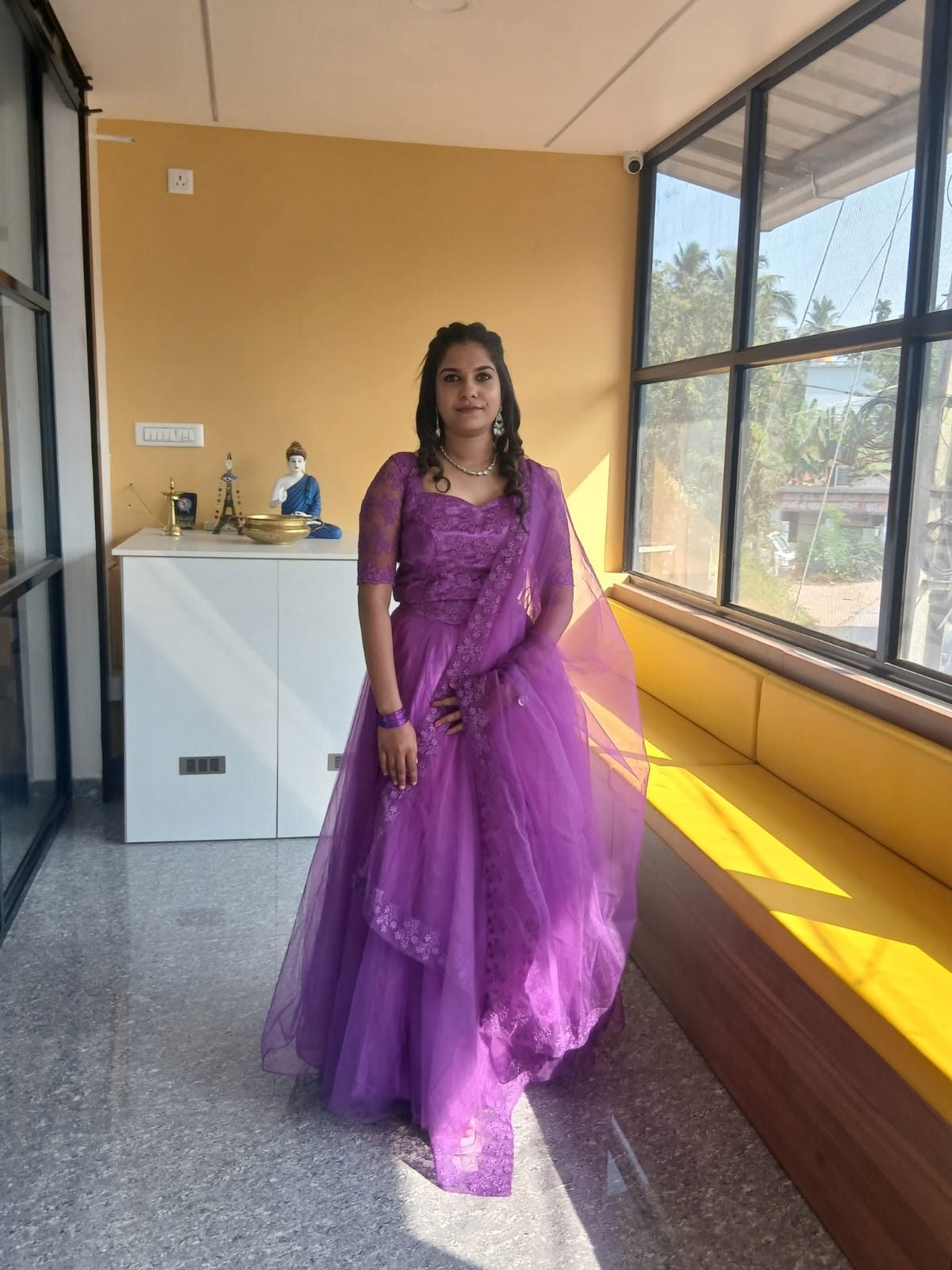 Bridal client in purple gown with elegant styling